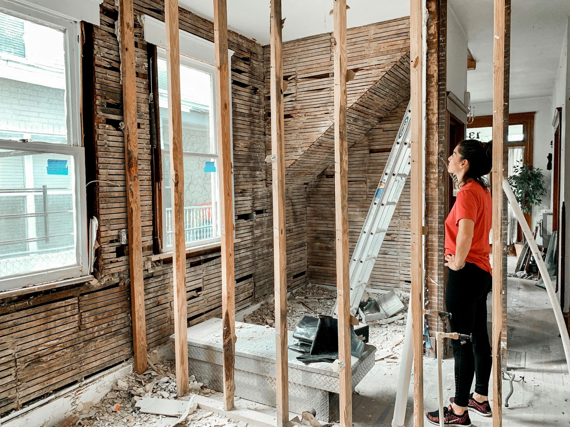 Woman in a home home mid-way through renovation